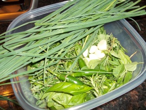 Herbs from the garden plus garlic and hot peppers