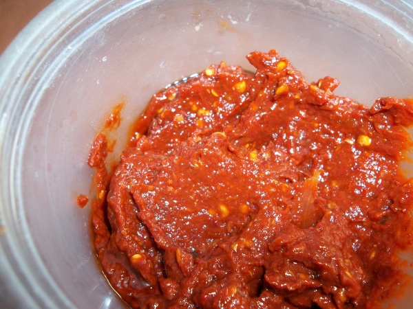 I grind up my chipotle peppers in adobo and store for easy use.